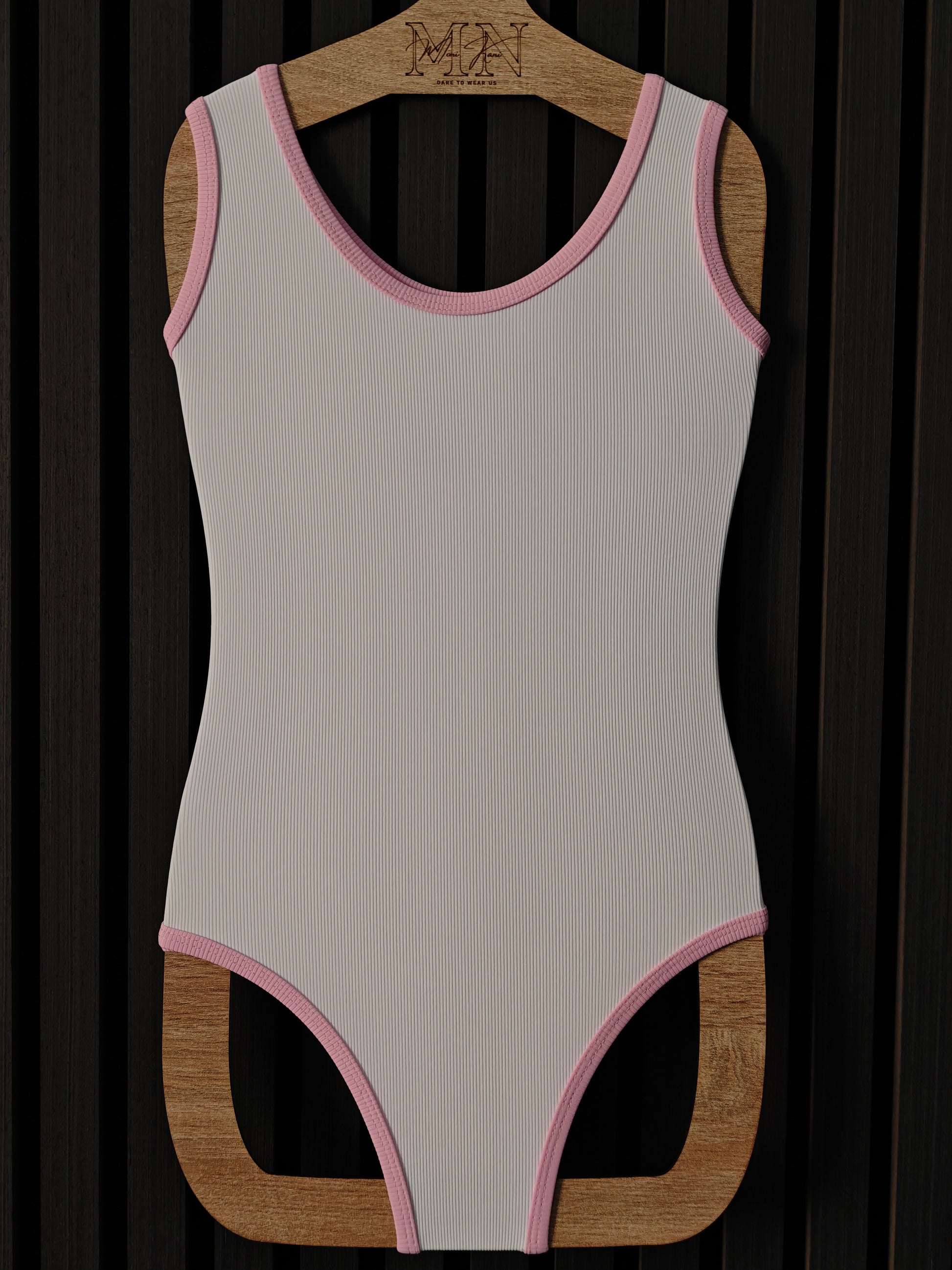White one-piece swimwear with baby pink edges from ribbed fabrics, for kids 2-10 years old 