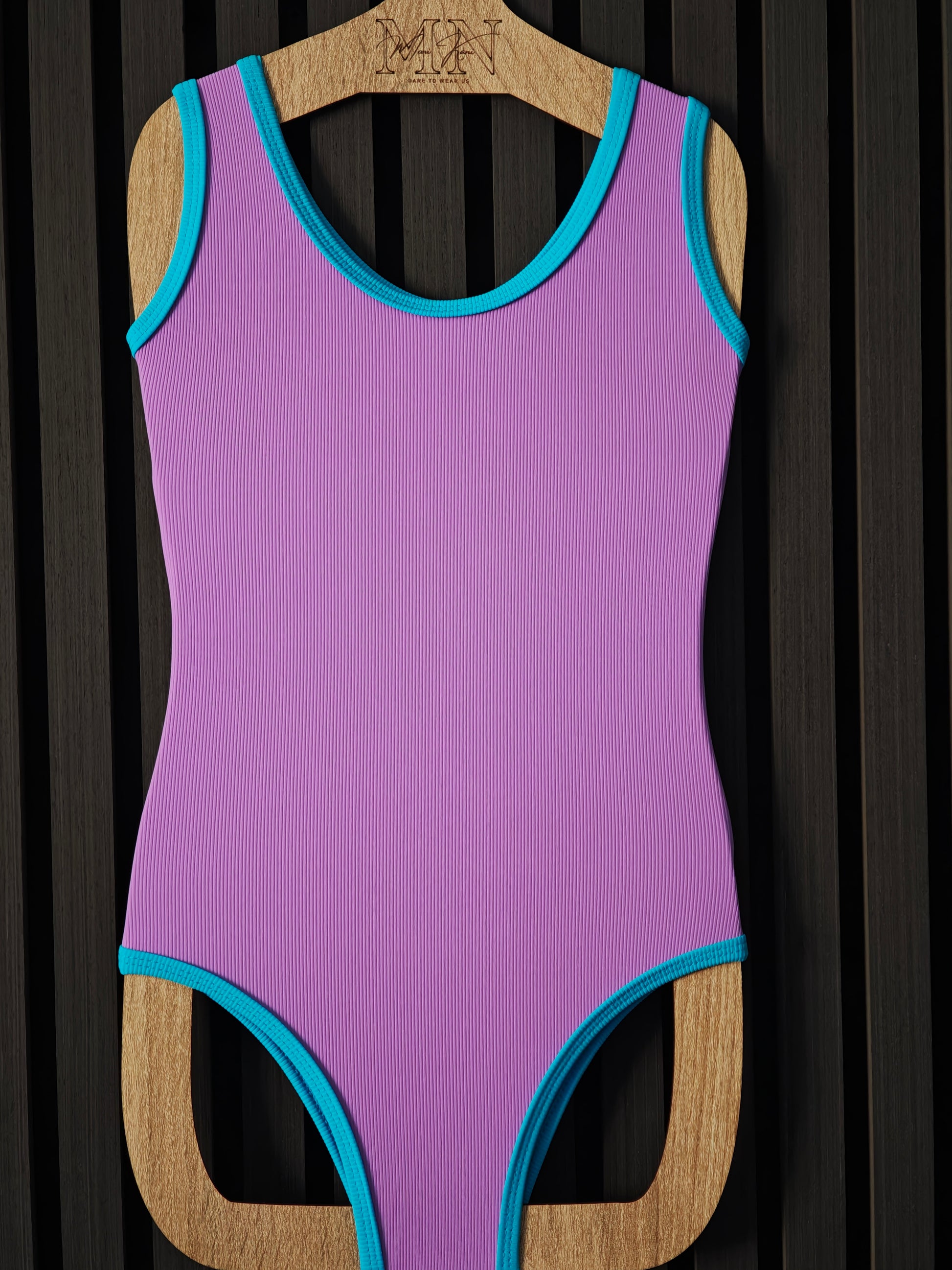 Mix of purple and blue one-piece swimsuit for kids aged 2-10, made from ribbed fabrics 